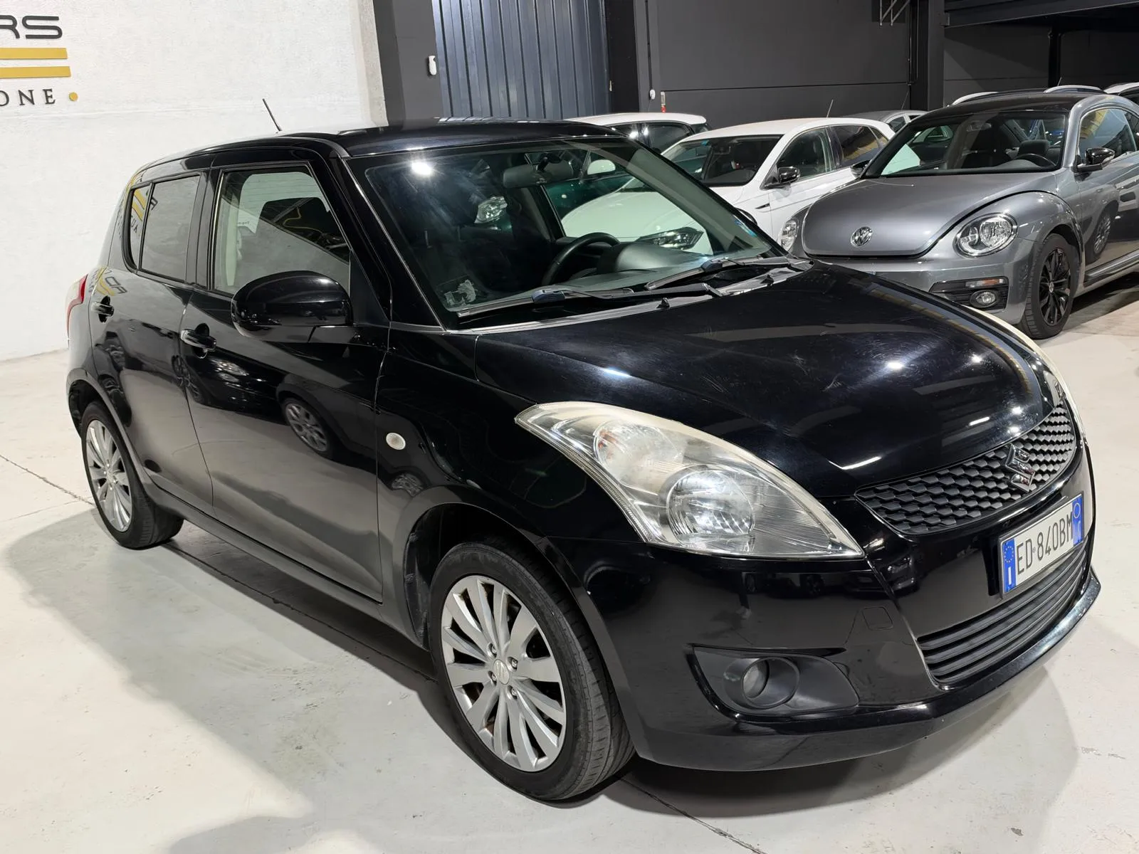 Suzuki Swift 4x4 Benzina Neopatentati 2011 — foto 7